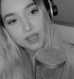 Black and white close-up of iLo at the studio microphone